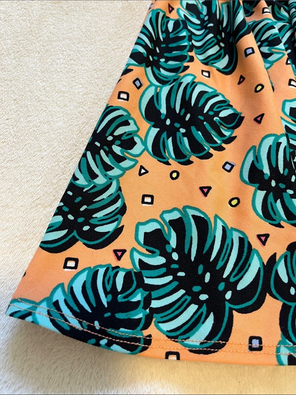 Dot Dot Smile | Little Girls Peach Monstera Leaf Dress 3/4